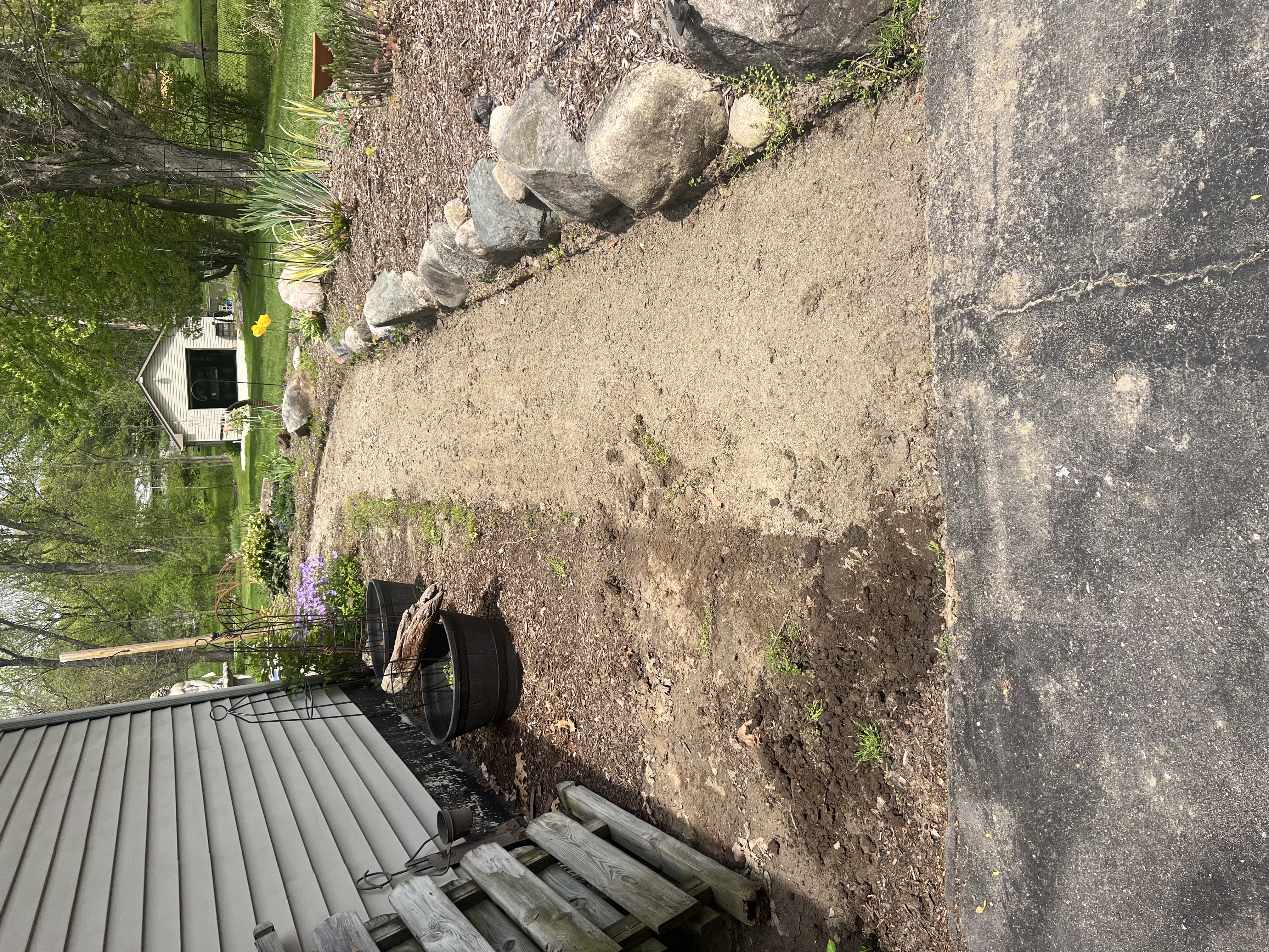 Before: gravel and dirt walkway